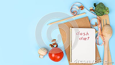 Notebook with pencil different kitchen and cooking utensils on blue background. Dash diet. Culinary blog recipe template online Stock Photo