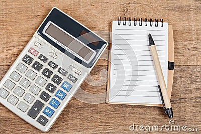 Notebook showing empty page and calculator Stock Photo