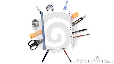 Notebook with stationary objects in the background Stock Photo