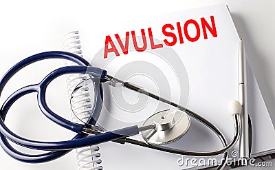 Notebook with text AVULSION with pen and stethoscope Stock Photo