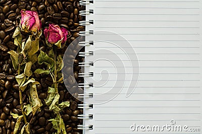 Notebook and wizened rose Stock Photo