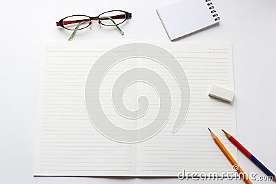 Notebook and writing utensils Stock Photo