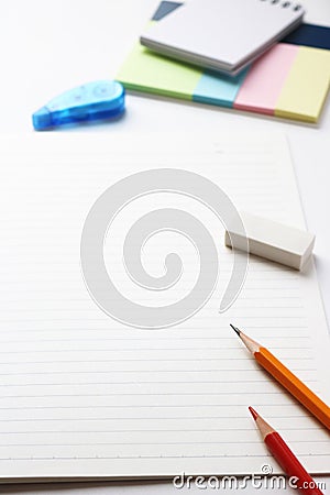 Notebook and writing utensils Stock Photo