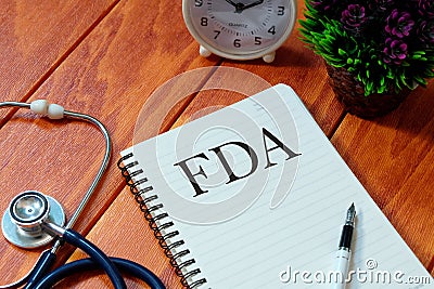 Notebook written with FDA & x28;Food and Drug Administration. Stock Photo