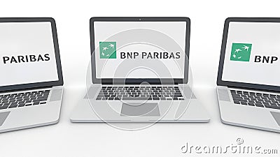 Notebooks with BNP Paribas logo on the screen. Computer technology conceptual editorial 3D rendering Editorial Stock Photo