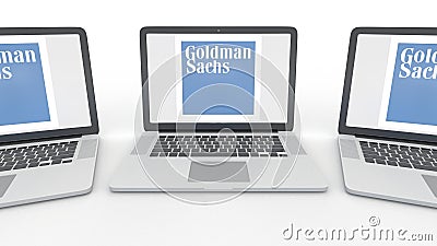 Notebooks with The Goldman Sachs Group, Inc. logo on the screen. Computer technology conceptual editorial 3D rendering Editorial Stock Photo