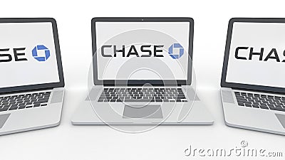 Notebooks with JPMorgan Chase Bank logo on the screen. Computer technology conceptual editorial 3D rendering Editorial Stock Photo