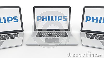 Notebooks with Philips logo on the screen. Computer technology conceptual editorial 3D rendering Editorial Stock Photo