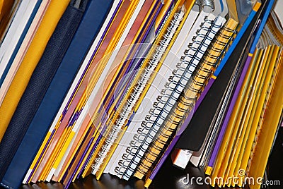 Notebooks on shelf Stock Photo