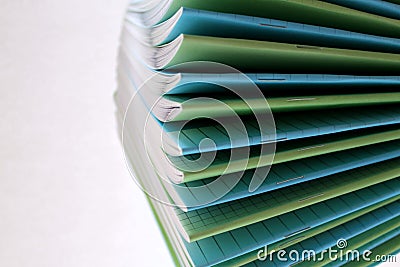 Thin notebook for writing in the colored school Stock Photo