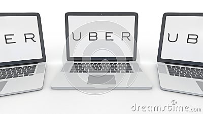 Notebooks with Uber Technologies Inc. logo on the screen. Computer technology conceptual editorial 3D rendering Editorial Stock Photo