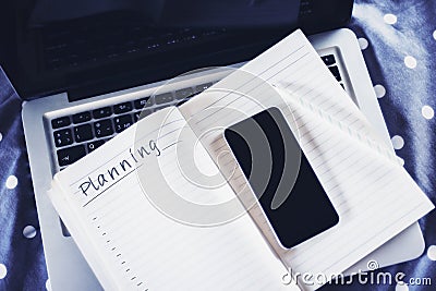 Notepad and cellphone Stock Photo