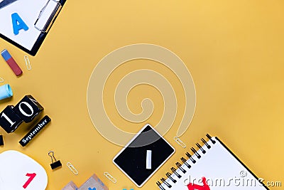 Notepad and notebooks with stationery. Golden, white, pink and black stationery back to school concept. Top horizontal view Stock Photo