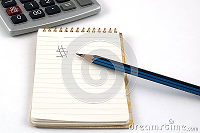 Notepad, Pencil and Calculator Stock Photo