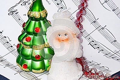 Notes and Christmas balls. Christmas sounds motive Stock Photo