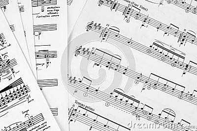 Notes sheet music learning play guitar arpeggios piano saxophone harp violin cello bass oboe flute orchestra score conductor choir Stock Photo