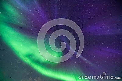 A nothern lights corona explodes over the night sky Stock Photo