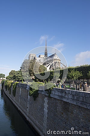 Notre Dame cathedral, Paris along the river Seine. Editorial Stock Photo