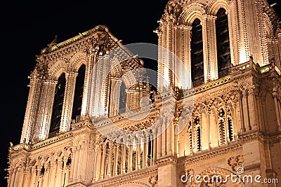 Notre Dame Cathedral in Paris and its lighting at night Stock Photo