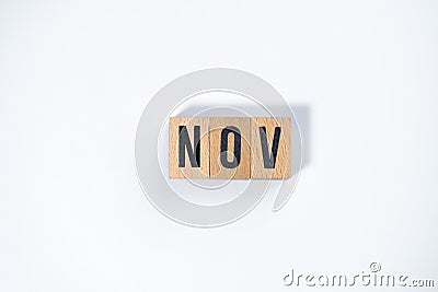 ` NOV ` text made of wooden cube on White background Stock Photo