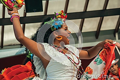 Female folk dancer performing a typical dance Editorial Stock Photo