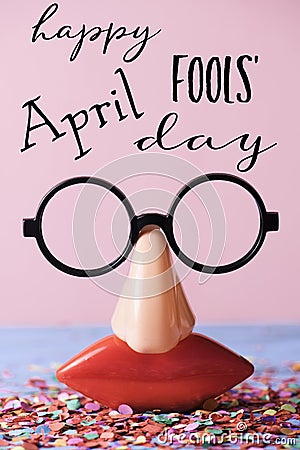 Novelty glasses and text happy april fools day Stock Photo