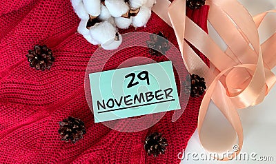 November 29 on a blue piece of paper. Stock Photo