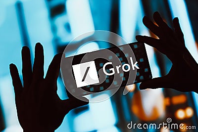 November 6, 2023, Brazil. The Grok logo is displayed on a smartphone screen. Grok is an artificial Cartoon Illustration
