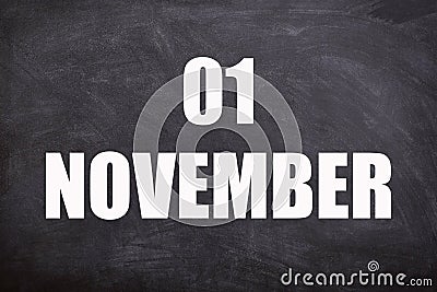 01 November text with blackboard background for calendar. Stock Photo