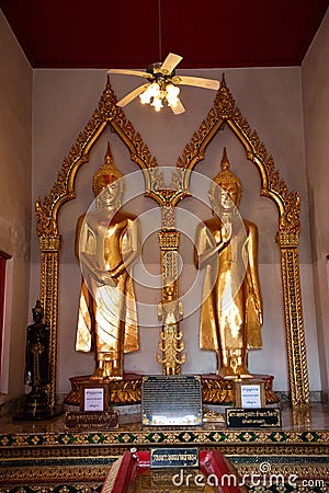 November 21th, 2018 - Bangkok THAILAND - Two standing golden Buddhas in thai temple Editorial Stock Photo