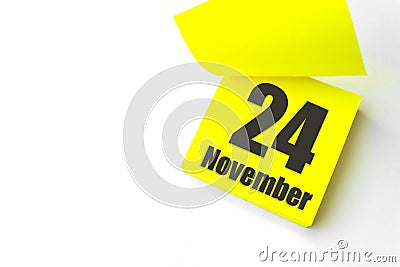 November 24th. Day 24 of month, Calendar date. Close-Up Blank Yellow paper reminder sticky note on White Background. Autumn month Stock Photo