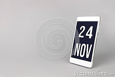 November 24th. Day 24 of month, Calendar date. Smartphone with calendar day, calendar display on your smartphone. Autumn month, Stock Photo