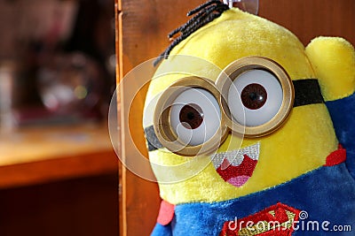 Minion toy dressed in a Superman costume Editorial Stock Photo