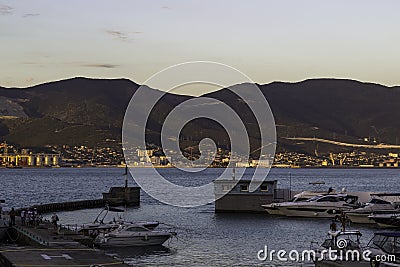 Anchorage of yachts in the sea bay. Mountains in the background. Editorial Stock Photo