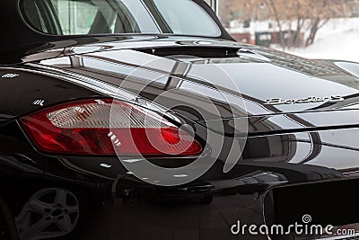 Rear quarter view of the 2006 sport porsche boxster s sedan prepared for sale and exhibited in the showroom with a polished shiny Editorial Stock Photo