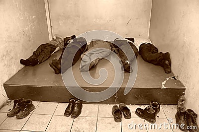 Prisoner in the Russian remand prison lies on the floor of the chamber Editorial Stock Photo