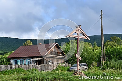 Novovarvarovka, Anuchinsky district, Primorsky region, Russia, August, 28, 2018. Worship orthodox cross at the road in the village Editorial Stock Photo