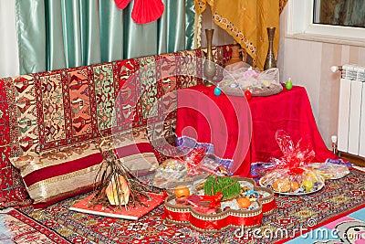 Novruz holiday background . Novruz holiday background . Novruz copper tray plate with Azerbaijan national pastry pakhlava and shek Stock Photo