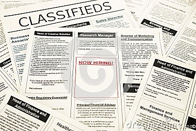Now hiring blank ad on newspaper Stock Photo