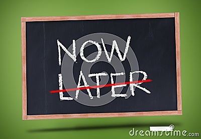 Now and later written on blackboard Stock Photo