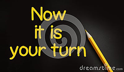 Now it is your turn words and yellow pencil on black background. Business Career concept Stock Photo