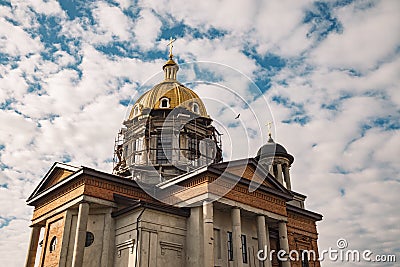 Nowadays orthodox church building construction facade religion architecture stone and concrete walls exterior with pillars and Stock Photo