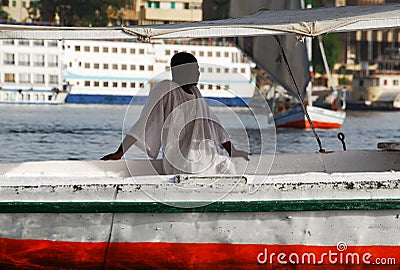 Nubian sailor sailing on the Nile river. Editorial Stock Photo