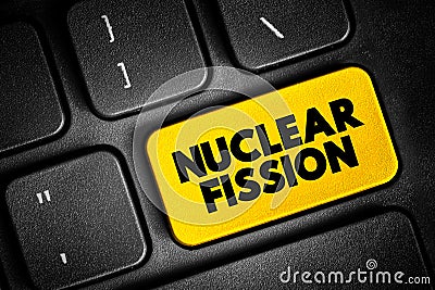 Nuclear Fission - reaction in which the nucleus of an atom splits into two or more smaller nuclei, text concept button on keyboard Stock Photo