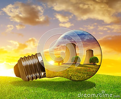 Nuclear power plant in light bulb. Stock Photo