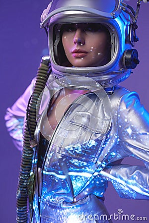Nude cosmic woman in silver suit and helmet Stock Photo