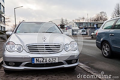 Mercedes Benz car stands on a parking stripe Editorial Stock Photo