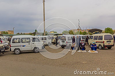 NUKUS, UZBEKISTAN - APRIL 21, 2018: Minibus marshrutka station in Nukus, Uzbekist Editorial Stock Photo