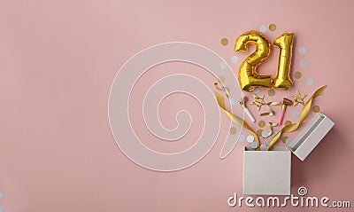 Number 21 birthday balloon celebration gift box lay flat explosion Stock Photo