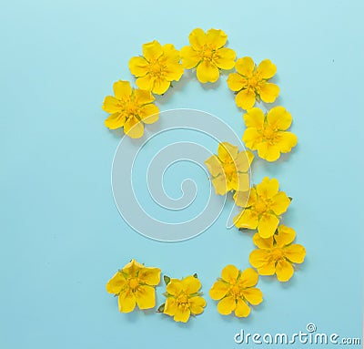 Number 3 on a blue background from yellow bright spring flowers. Children`s age, baby month, symbol of flowers Stock Photo